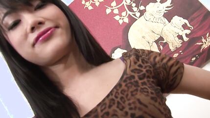 Asian t-girl stuffs her ass with dildo