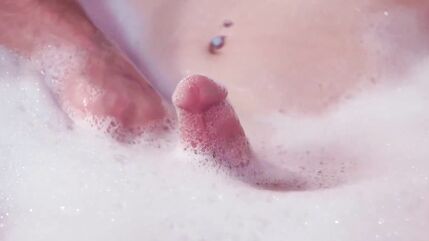 Busty trans wife Izzy Wilde is bathed by her loving husband.The big boobs shemale is jerked